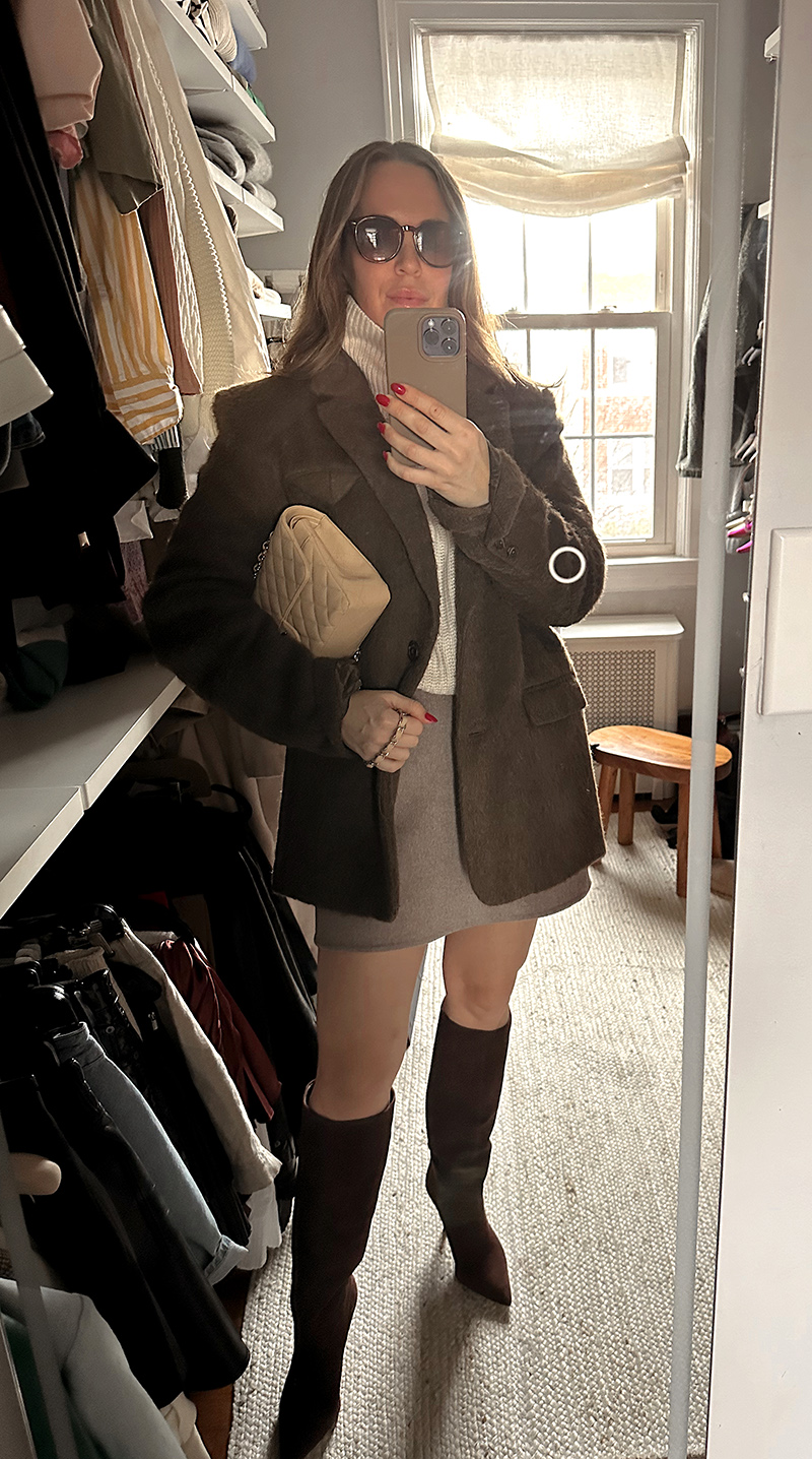 woman taking a mirror selfie 